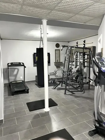 a view of swimming pool with seating space