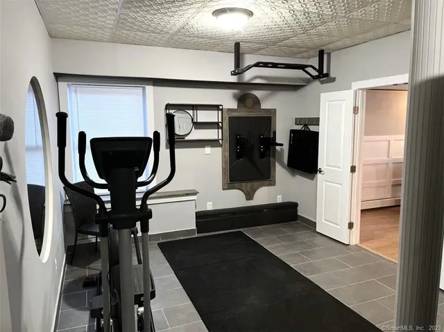 a view of a swimming pool with an outdoor space and seating area