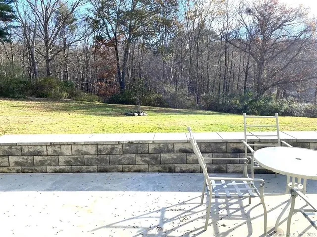 a view of a ocean beach and mountain