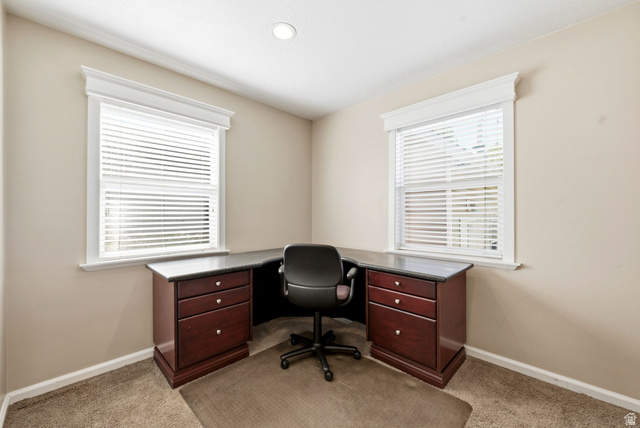 310 East 600 South Centerville, UT 84014 - Photo 14 of 41 Corner room featuring two windows with white blinds and ornate window trim