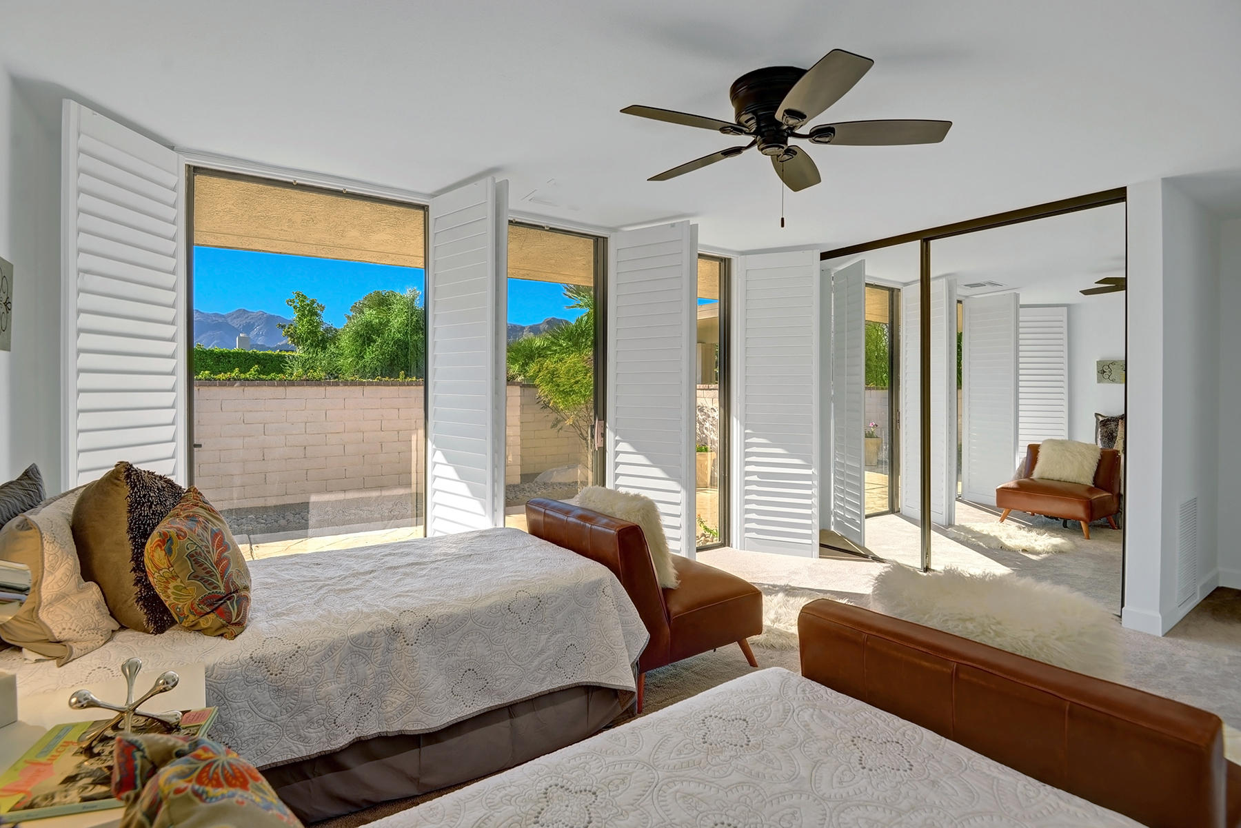 34 Duke Drive Rancho Mirage, CA 92270 - Photo 14 of 32 a bedroom with a bed and a large window