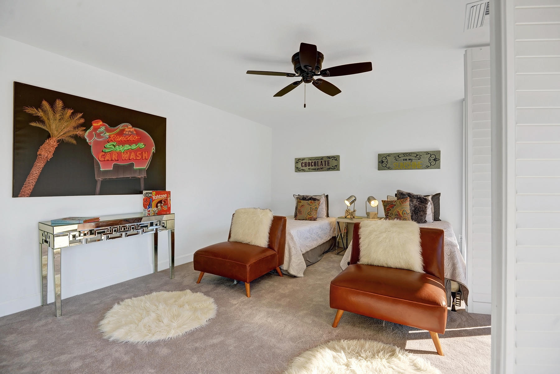 34 Duke Drive Rancho Mirage, CA 92270 - Photo 15 of 32 a living room with furniture and a flat screen tv
