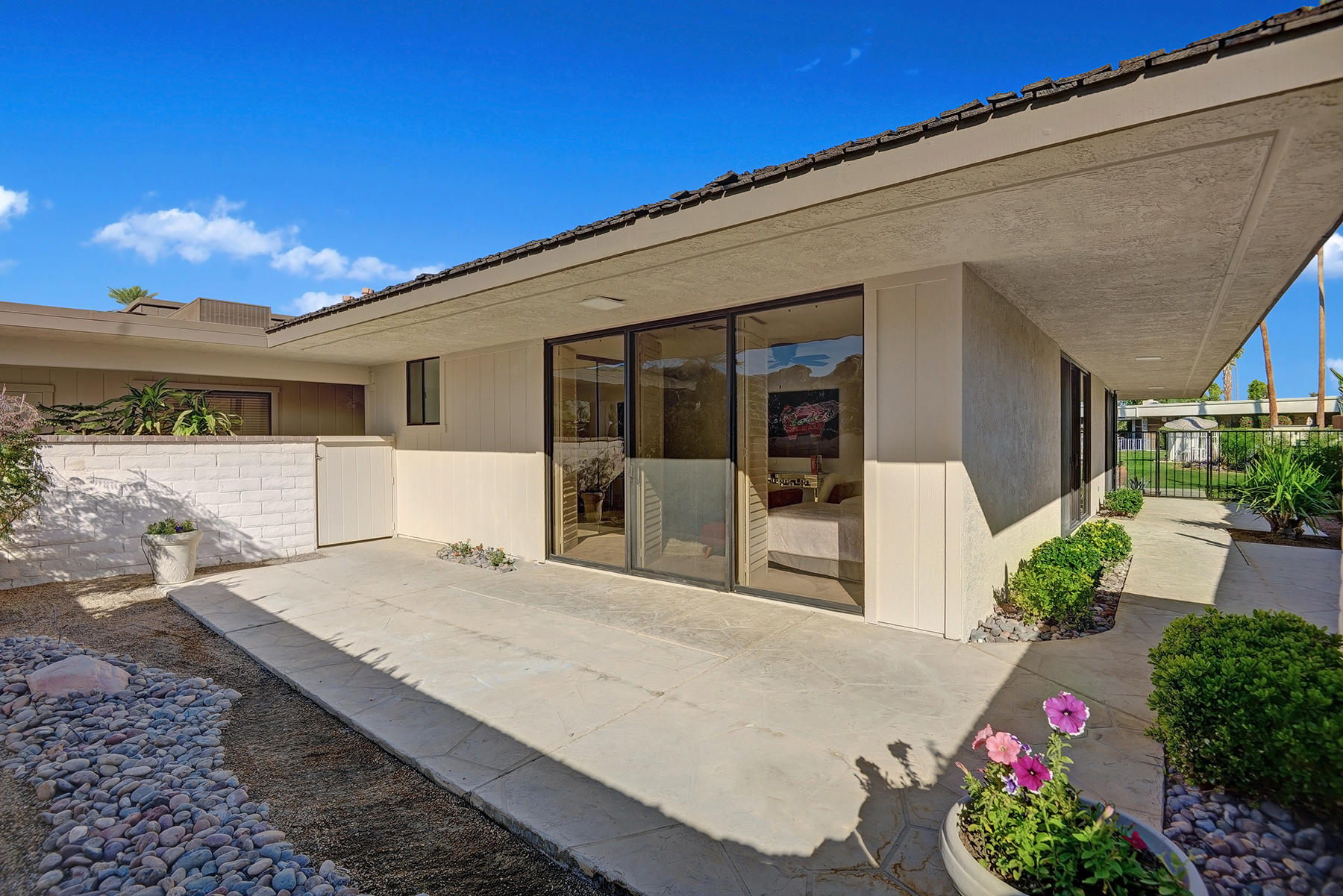 34 Duke Drive Rancho Mirage, CA 92270 - Photo 16 of 32 a view of a house with a patio