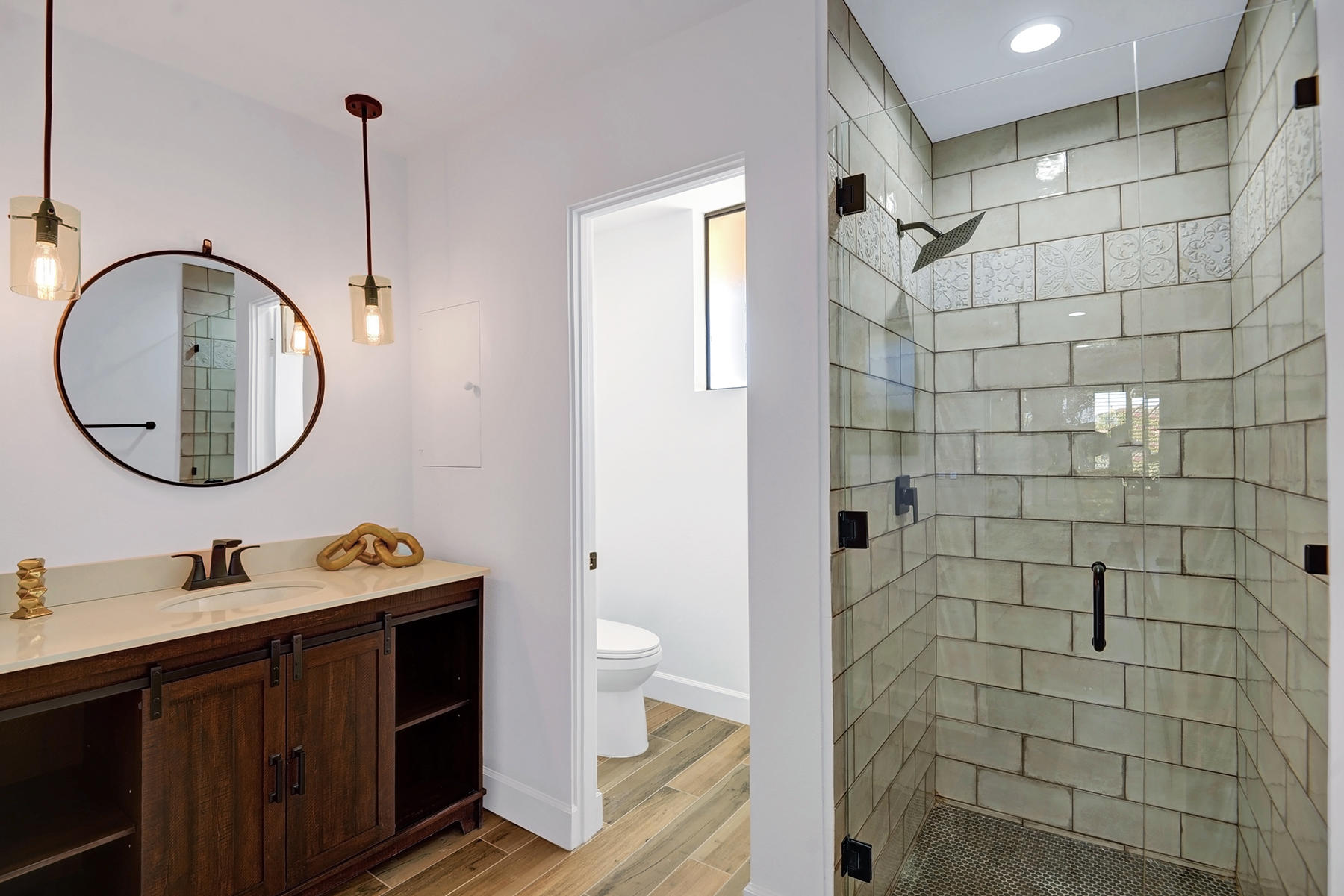 34 Duke Drive Rancho Mirage, CA 92270 - Photo 17 of 32 a bathroom with a sink a toilet and a mirror