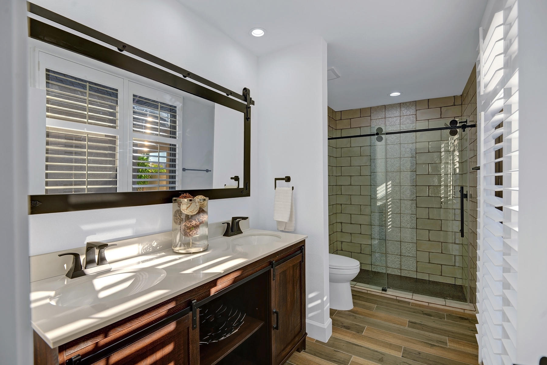 34 Duke Drive Rancho Mirage, CA 92270 - Photo 20 of 32 a bathroom with a granite countertop sink toilet and shower