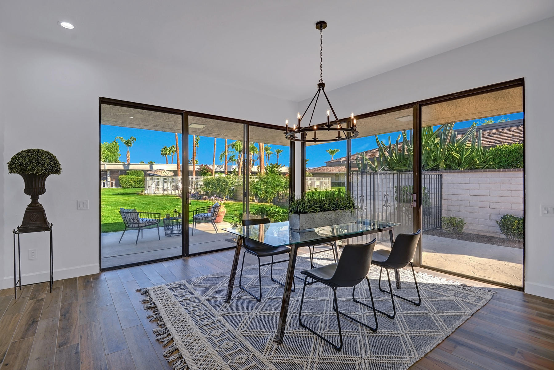 34 Duke Drive Rancho Mirage, CA 92270 - Photo 3 of 32 a dining room with furniture window and wooden floor