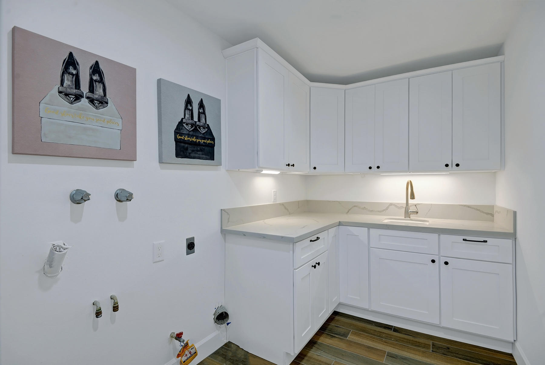 34 Duke Drive Rancho Mirage, CA 92270 - Photo 21 of 32 a kitchen with a sink and cabinets