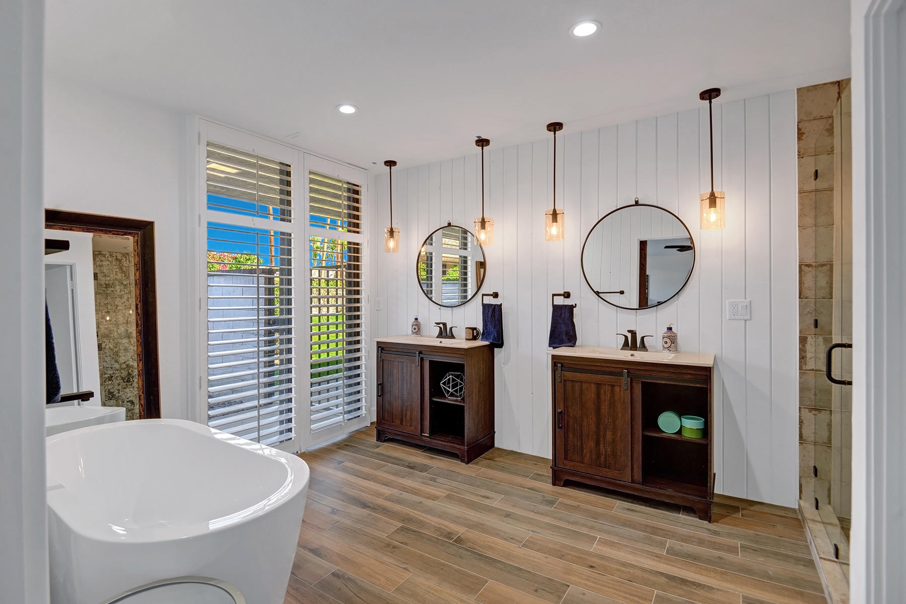 34 Duke Drive Rancho Mirage, CA 92270 - Photo 24 of 32 a living room with furniture a mirror and a fireplace