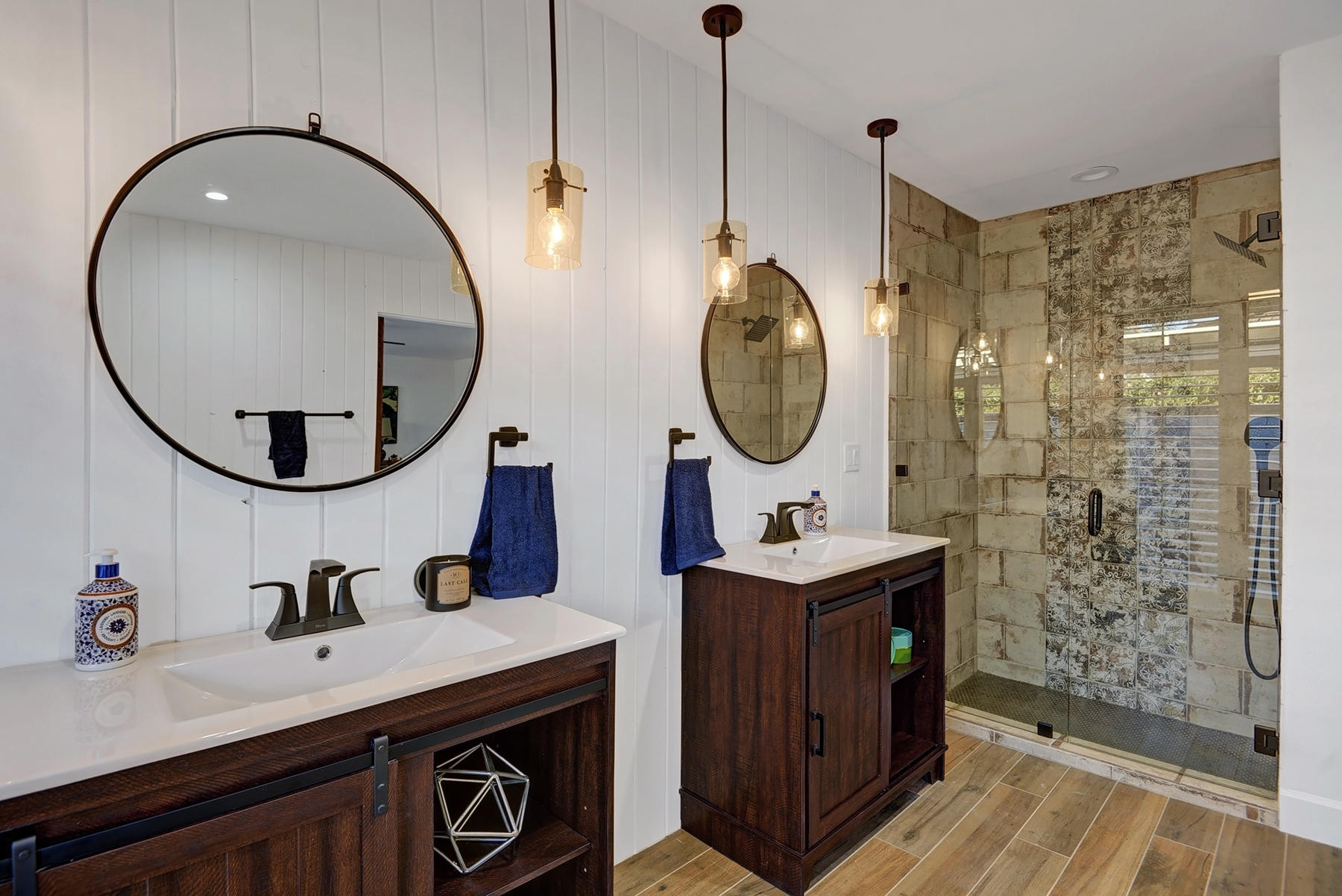 34 Duke Drive Rancho Mirage, CA 92270 - Photo 26 of 32 a bathroom with a sink mirror and vanity