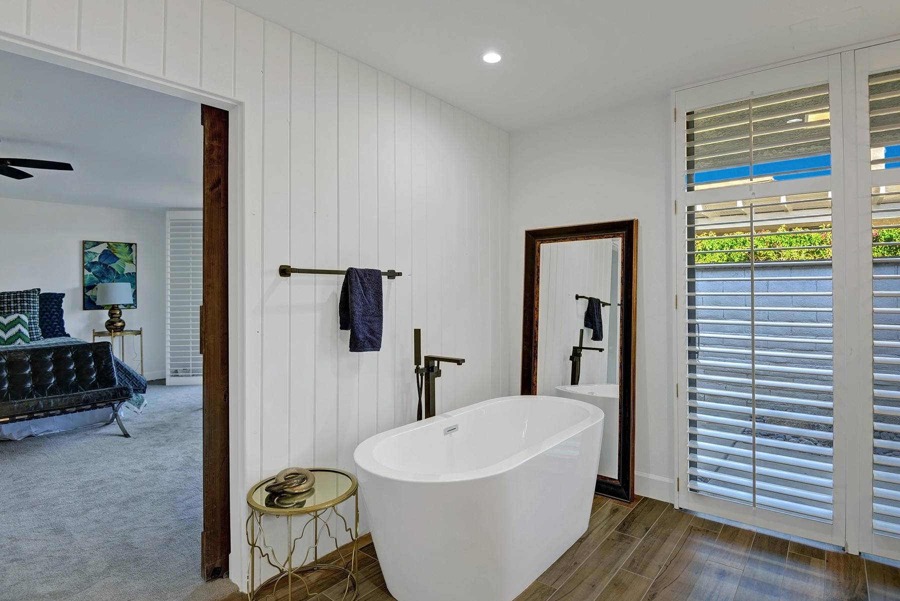 34 Duke Drive Rancho Mirage, CA 92270 - Photo 27 of 32 a bathroom with a sink and a mirror