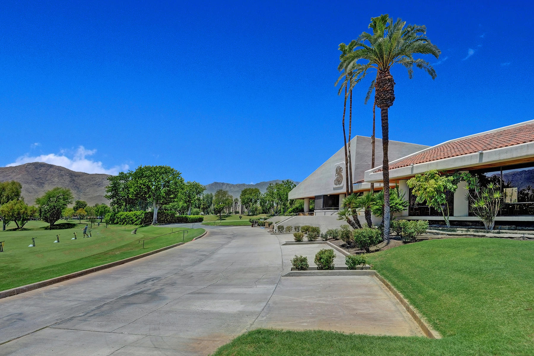 34 Duke Drive Rancho Mirage, CA 92270 - Photo 30 of 32 a house view with a garden space