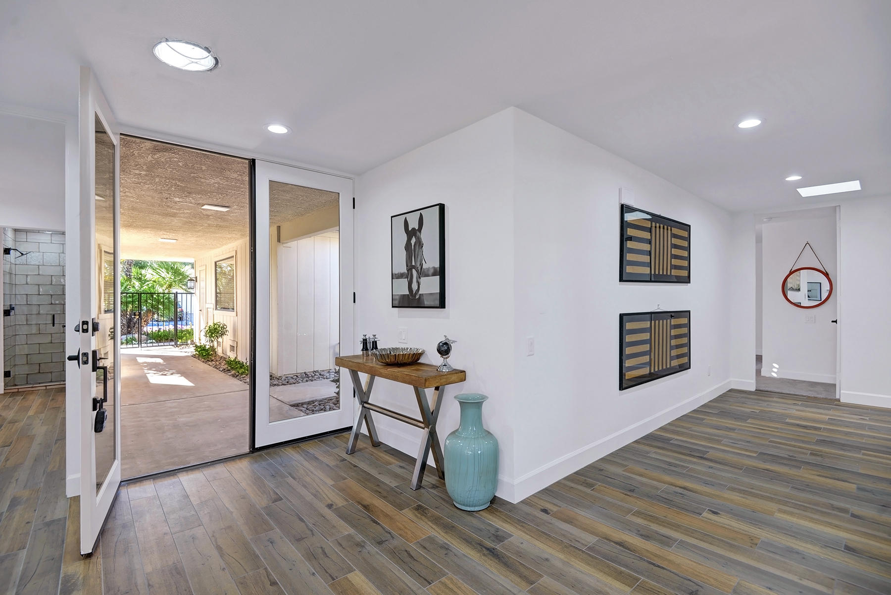 34 Duke Drive Rancho Mirage, CA 92270 - Photo 4 of 32 a living room with furniture and a wooden floor