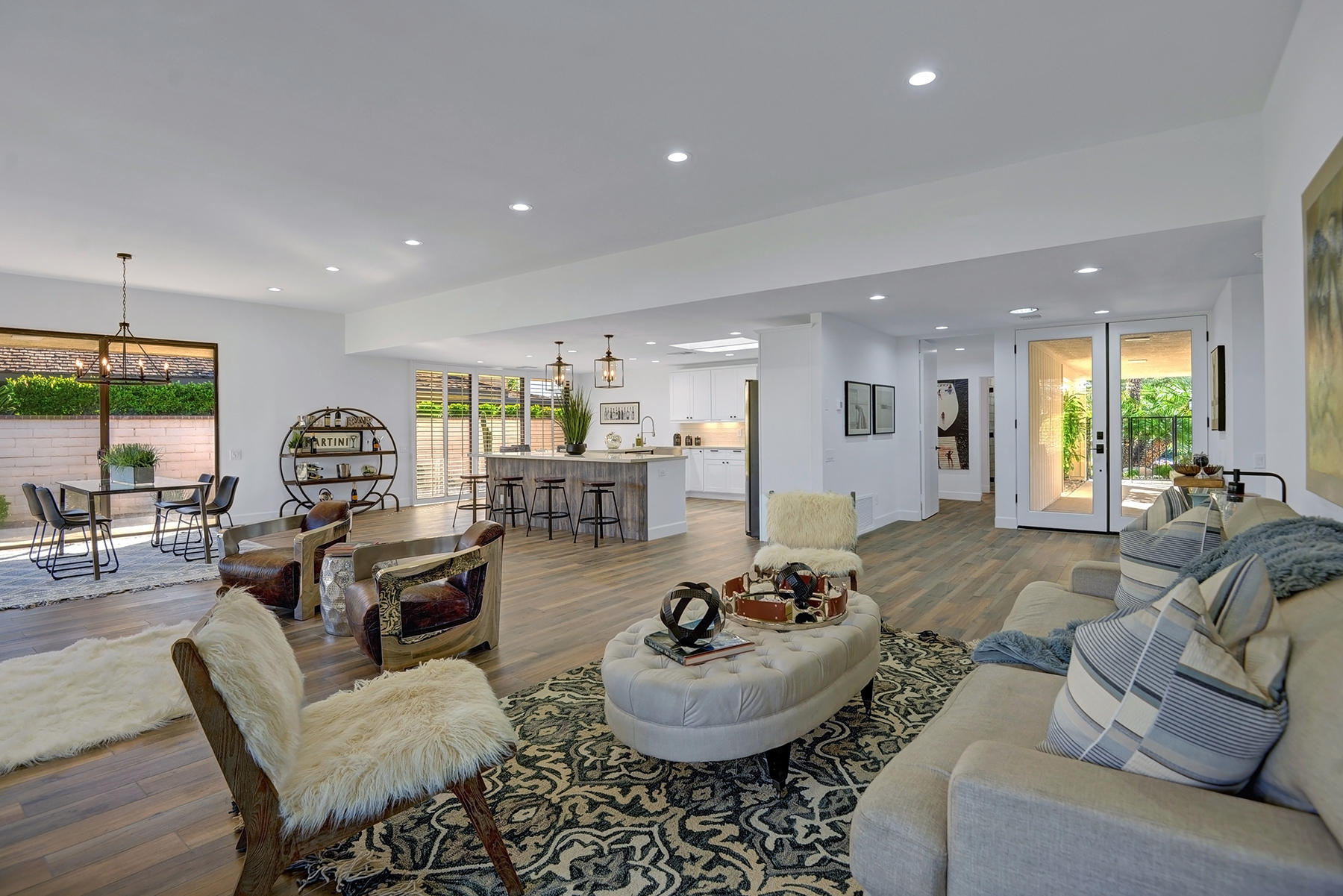 34 Duke Drive Rancho Mirage, CA 92270 - Photo 8 of 32 a living room with furniture and a view of kitchen