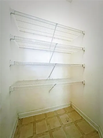 a view of a room with racks on the wall