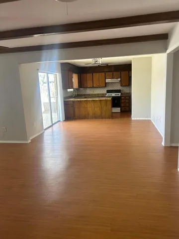 a view of kitchen with furniture and counter top