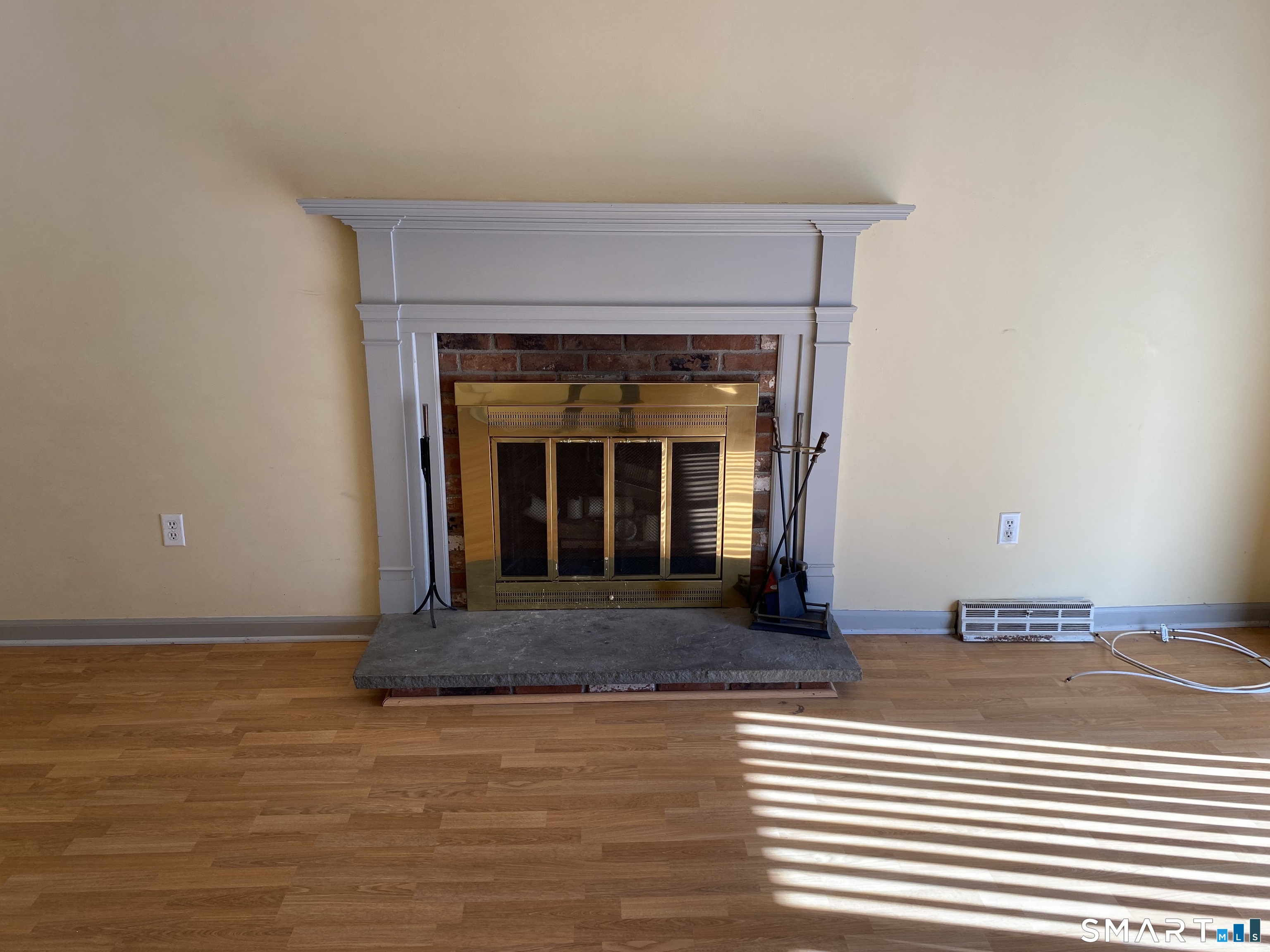57 Carriage Path South Milford, CT 06460 - Photo 4 of 11 a view of a livingroom with a fireplace