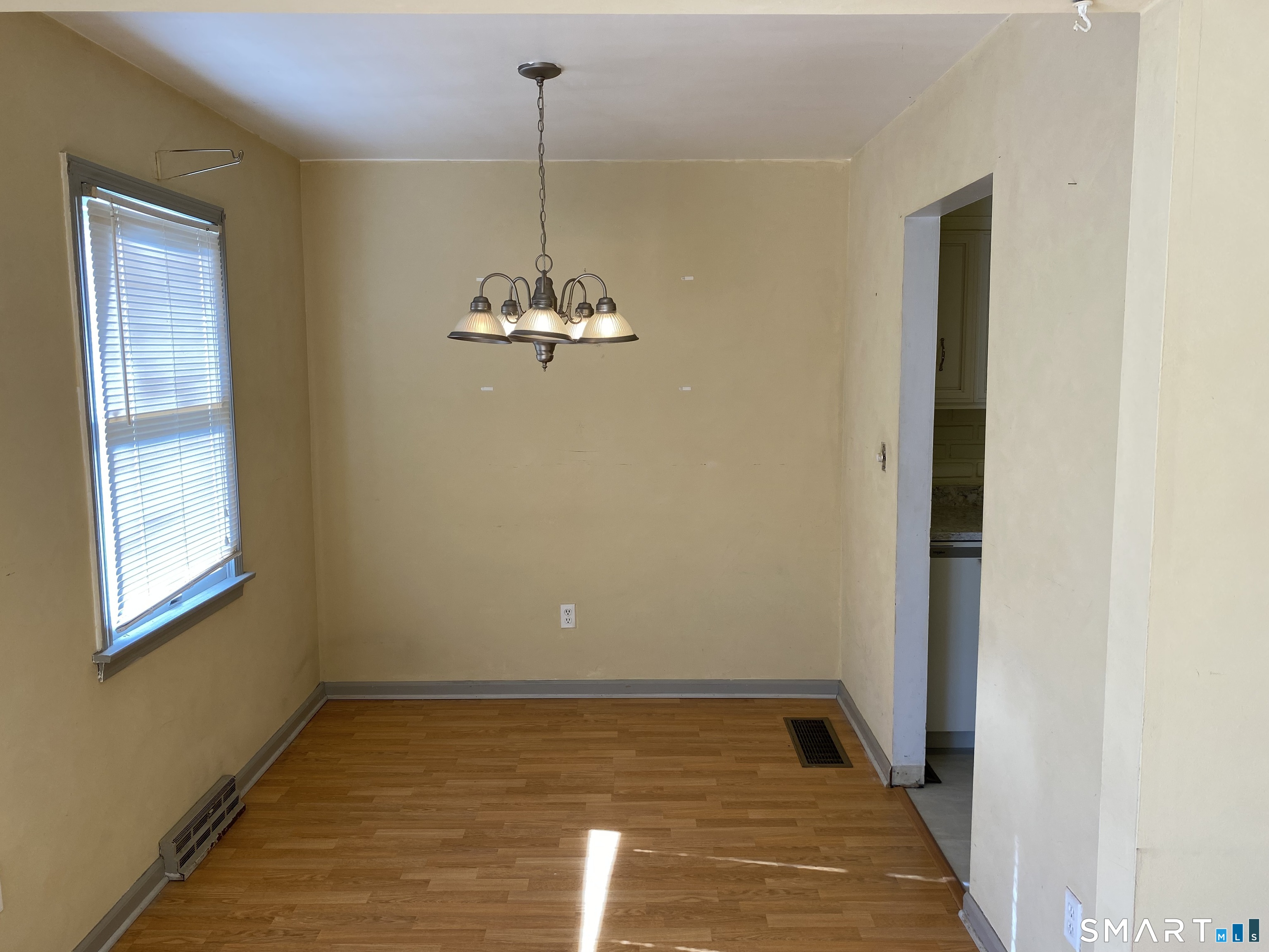 57 Carriage Path South Milford, CT 06460 - Photo 6 of 11 a view of an empty room with a window