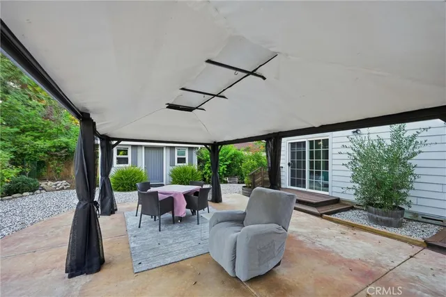 a view of a chair and fire pit