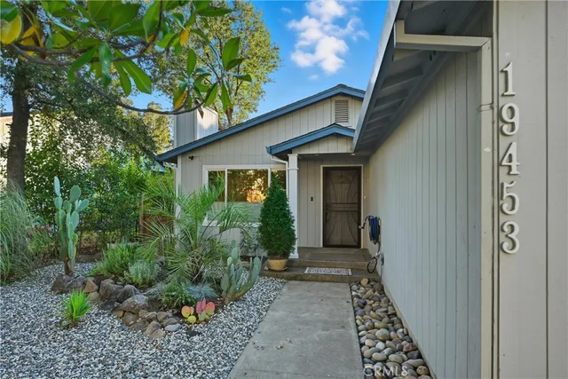 a house with trees in front of it