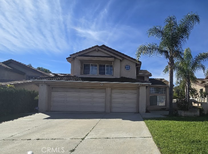 20667 Bakal Drive Riverside, CA 92508 - Photo 1 of 1 a front view of a house with a garden