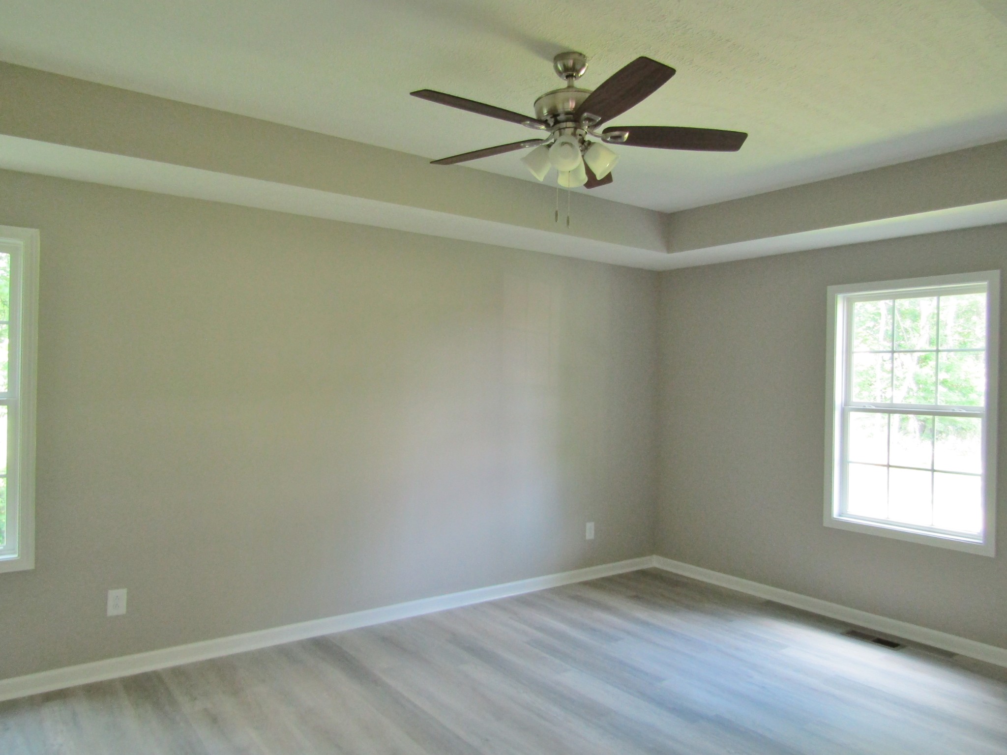 308 Ostella Road Cornersville, TN 37047 - Photo 13 of 19 an empty room with a window and a fan