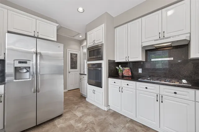 $450,000 | 5522 Whisper Ridge Drive, Sugar Land, TX 77479