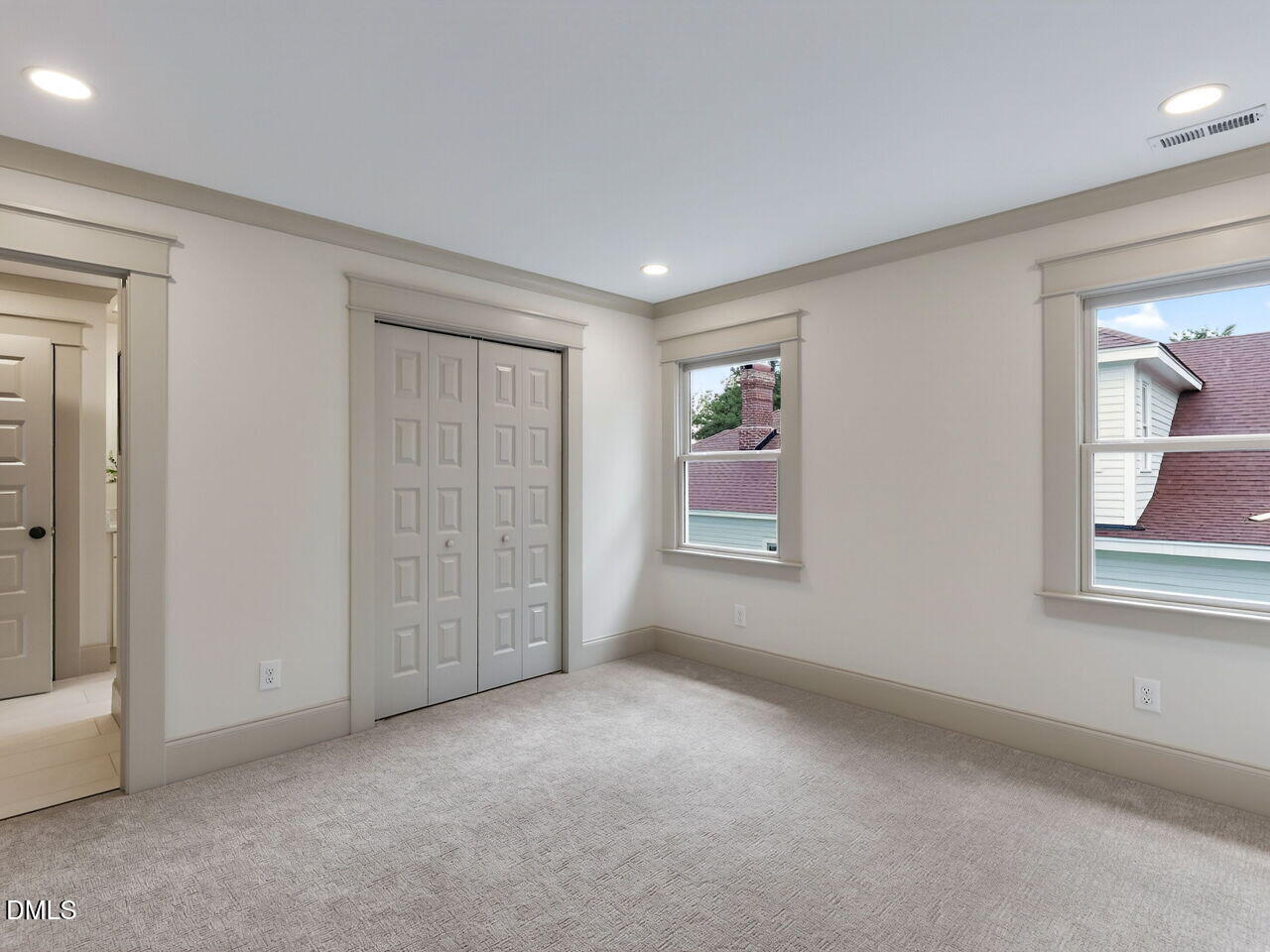504 Tilden Street Raleigh, NC 27605 - Photo 41 of 58 an empty room with windows