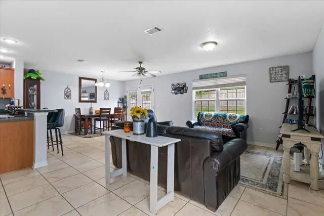 a view of a kitchen and dining room