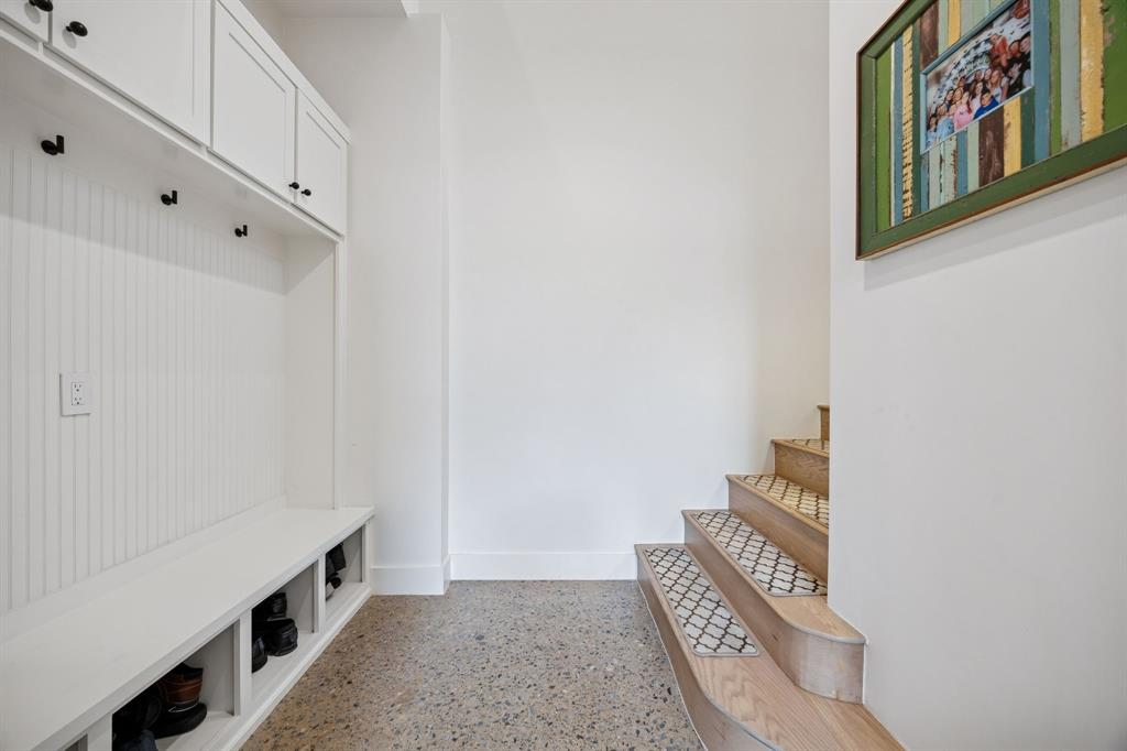 5104 Vandelia Street Dallas, TX 75235 - Photo 18 of 40 a view of an entryway with wooden floor