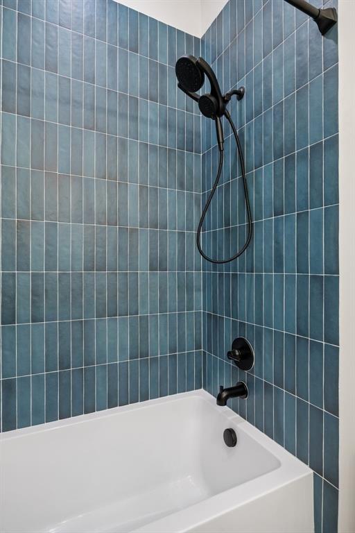 5104 Vandelia Street Dallas, TX 75235 - Photo 22 of 40 a bathroom with a bathtub