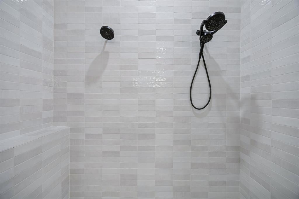 5104 Vandelia Street Dallas, TX 75235 - Photo 36 of 40 a bathroom with a shower