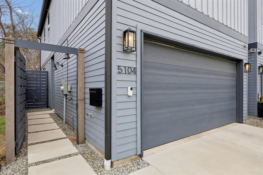 5104 Vandelia Street Dallas, TX 75235 - Photo 4 of 40 a view of a wooden door of the house