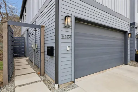 a view of a wooden door of the house