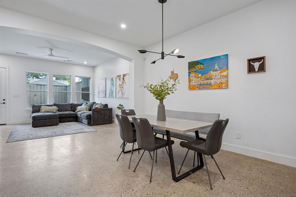 5104 Vandelia Street Dallas, TX 75235 - Photo 10 of 40 a view of a livingroom with furniture and window