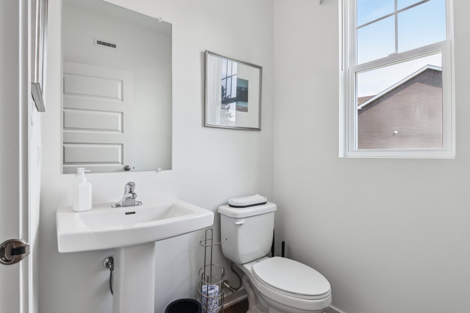 274 Snowdrop Lane Elgin, IL 60124 - Photo 14 of 42 a bathroom with a sink mirror and toilet