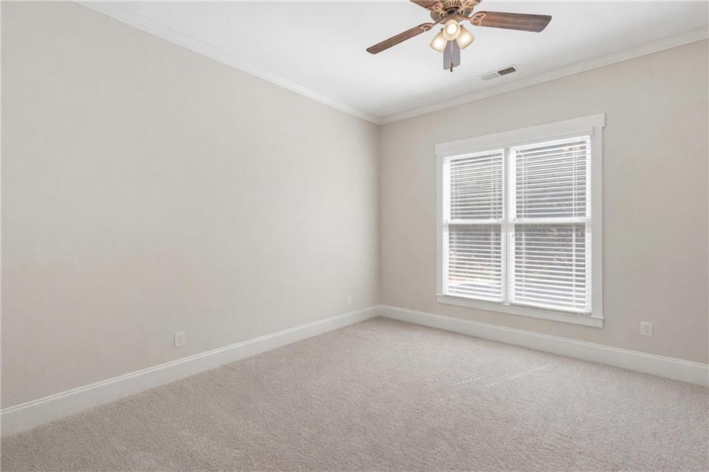 4340 Silent Path Cumming, GA 30028 - Photo 22 of 47 a view of an empty room with a window