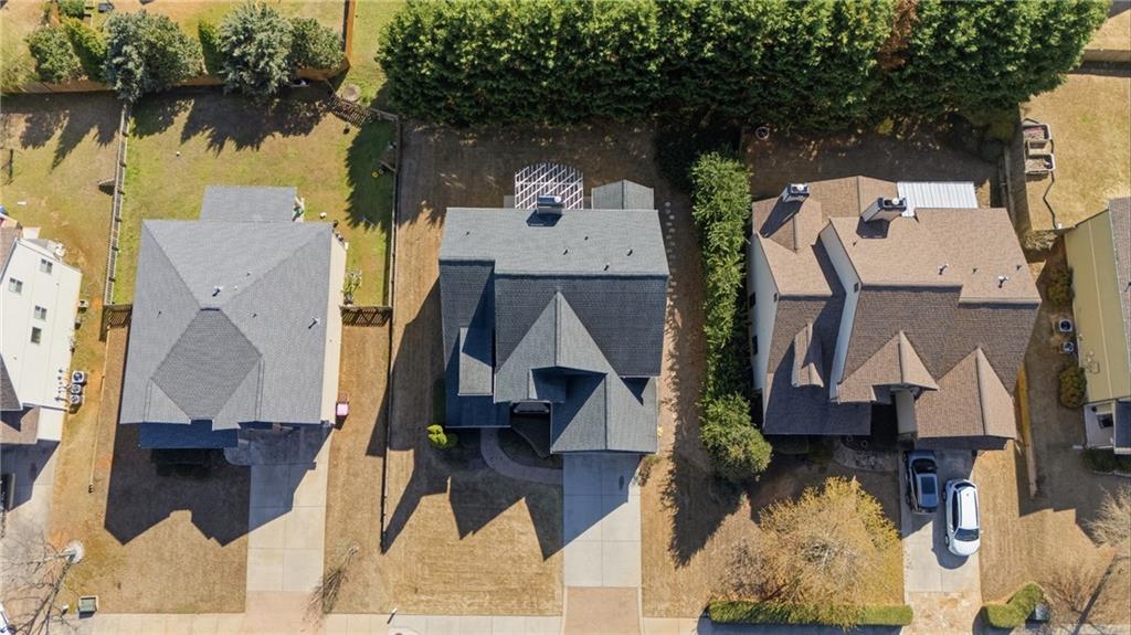 4340 Silent Path Cumming, GA 30028 - Photo 41 of 47 an aerial view of a house with swimming pool and large trees