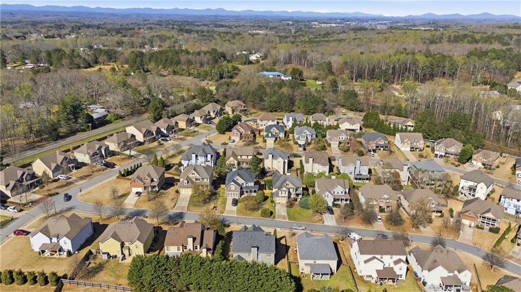 4340 Silent Path Cumming, GA 30028 - Photo 43 of 47 an aerial view of residential building with outdoor space