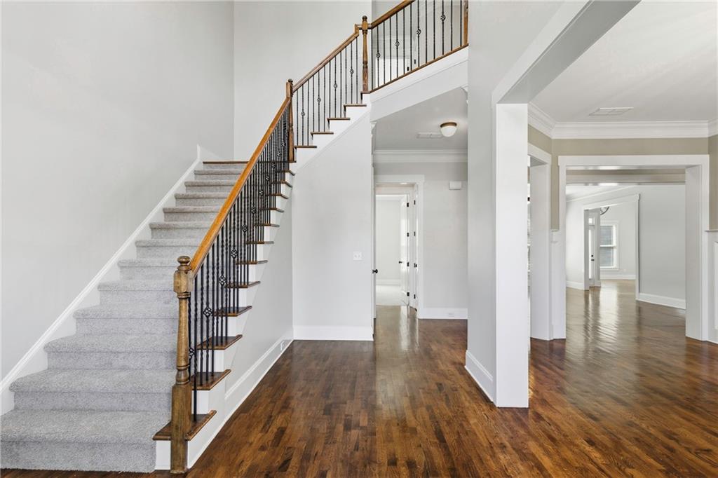 4340 Silent Path Cumming, GA 30028 - Photo 5 of 47 a view of entryway with wooden floor