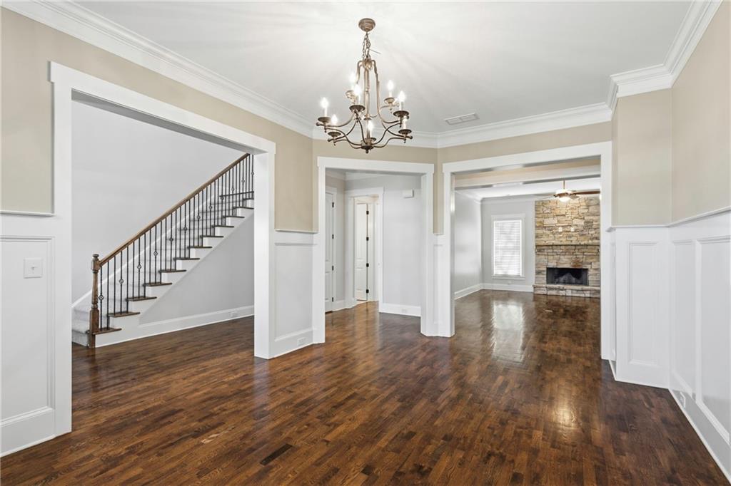 4340 Silent Path Cumming, GA 30028 - Photo 9 of 47 a view of entryway with wooden floor