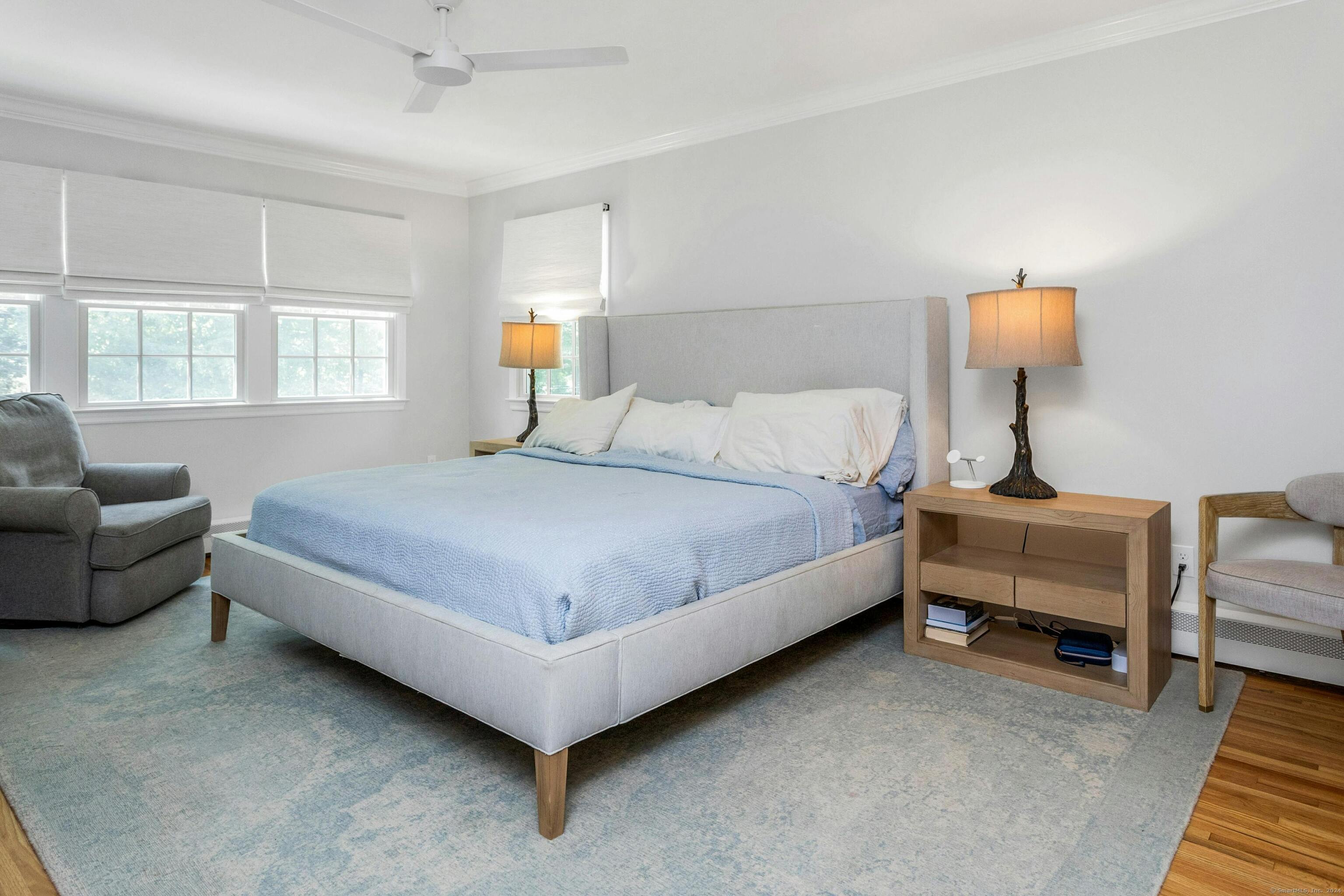 21 Roxbury Lane Wilton, CT 06897 - Photo 20 of 37 The primary bedroom has been updated in the past two years - the walk-in closet has been transformed in size and functionality. The primary bath has been updated and doubled in size.