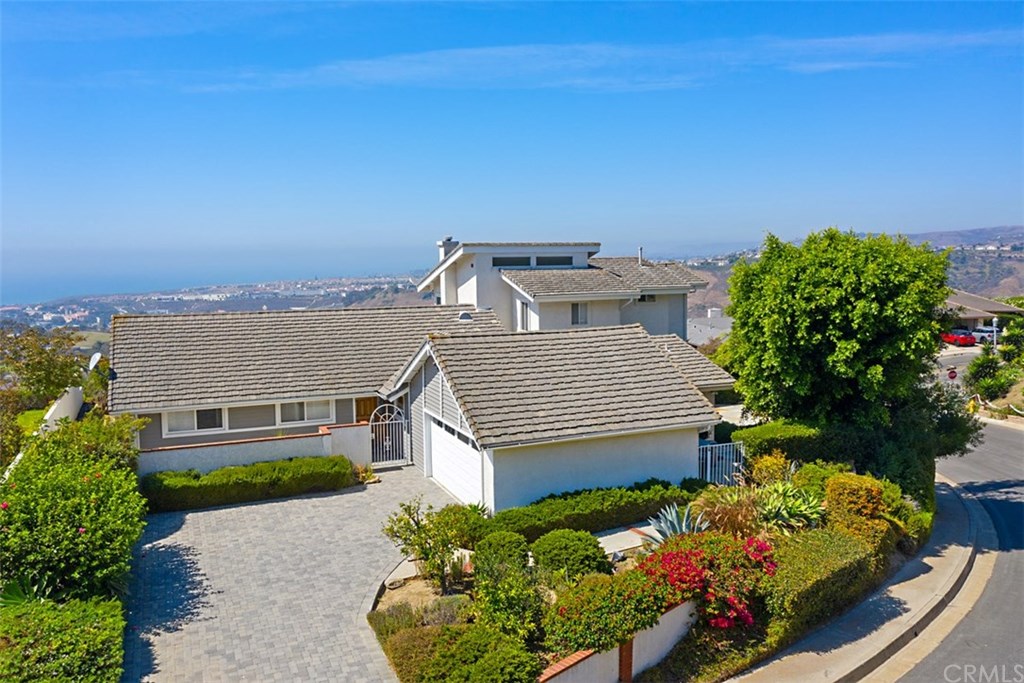 This Ocean View home sits on a corner lot over looking San Clement and the Pacific Ocean.