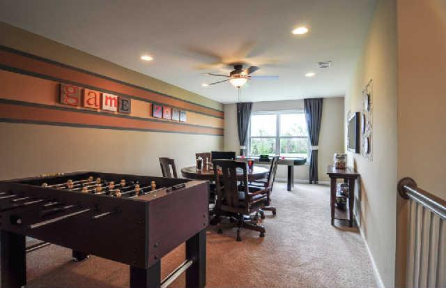 1406 Old Stone Road, Unit 443 Lebanon, TN 37087 - Photo 13 of 24 a view of a livingroom with furniture and windows