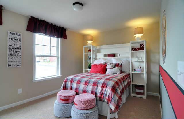 1406 Old Stone Road, Unit 443 Lebanon, TN 37087 - Photo 14 of 24 a bedroom with a bed and window
