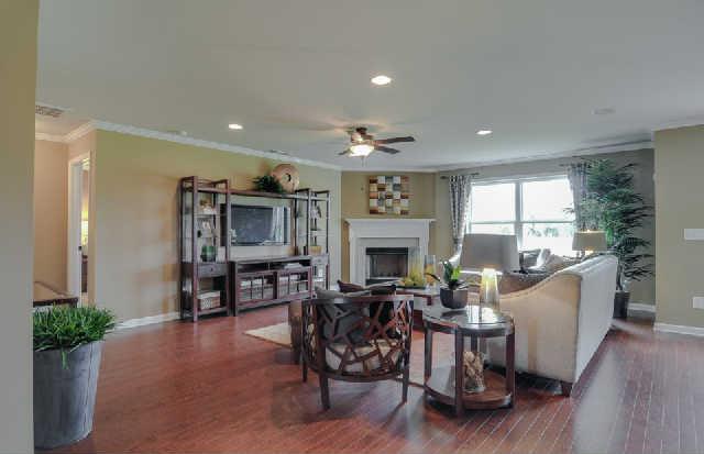 1406 Old Stone Road, Unit 443 Lebanon, TN 37087 - Photo 19 of 24 a living room with furniture a fireplace and a table