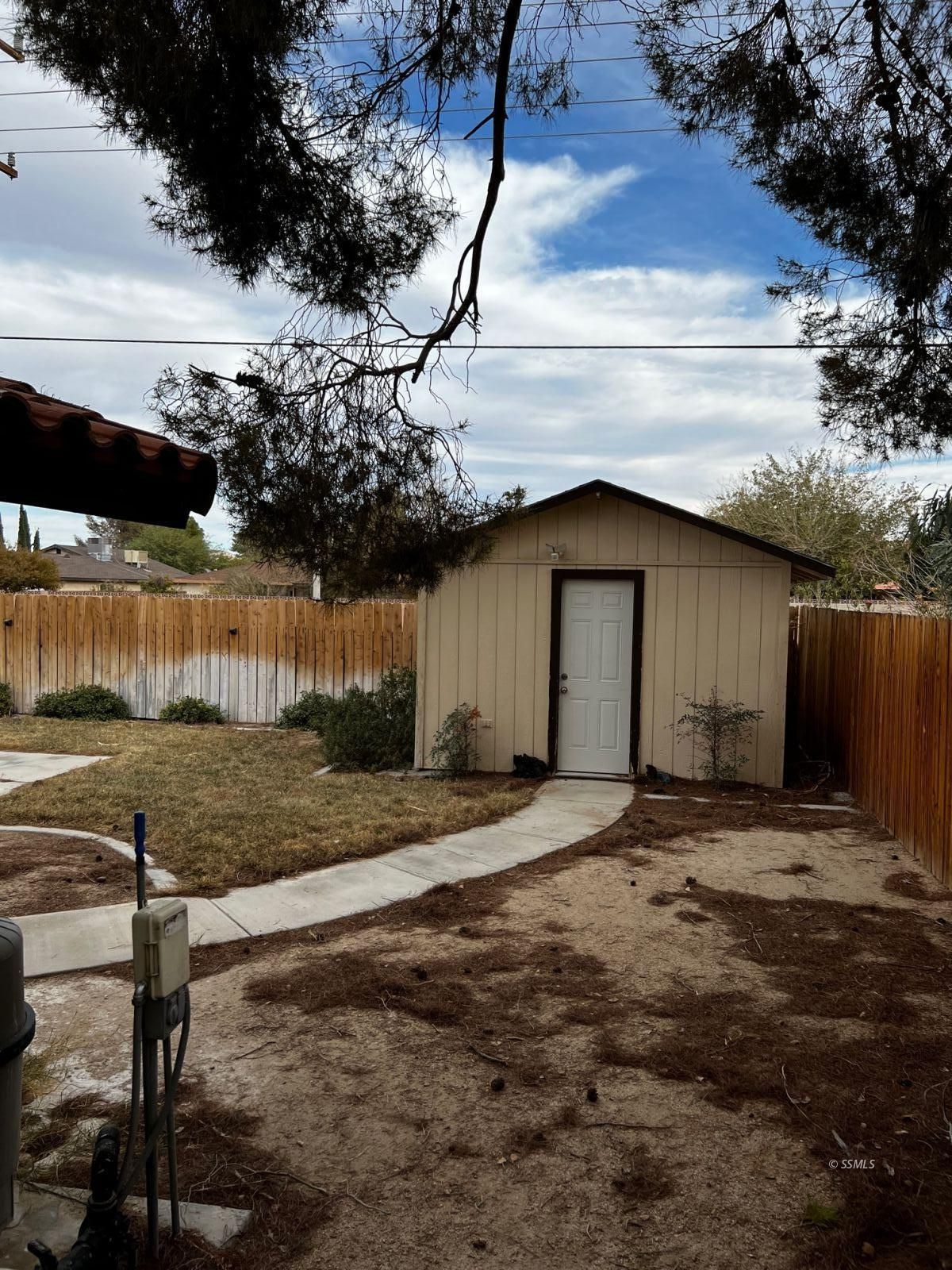 532 Las Posas Street Ridgecrest, CA 93555 - Photo 29 of 30 a house view with a backyard