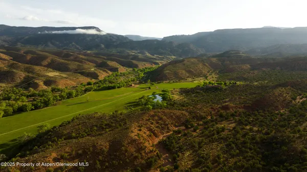 a view of a lake with a mountain