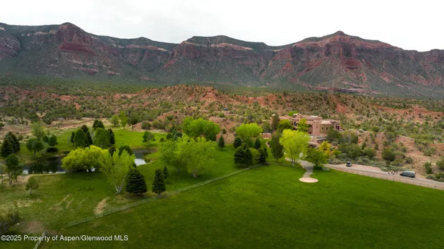a view of a lake with a mountain in the background