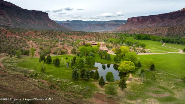 a view of a lake with mountains in the background