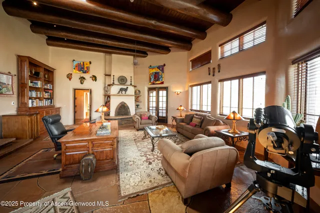 a bed room with a bed and balcony